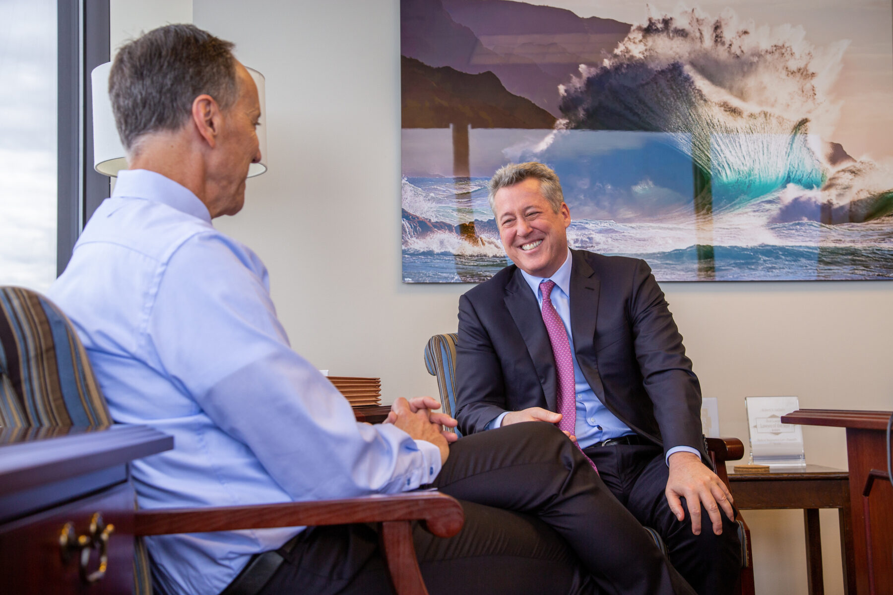 Robert Gellatly and David Beninger talking in Robert's office.